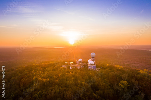sunset on abandoned surveillance station in berlin photo
