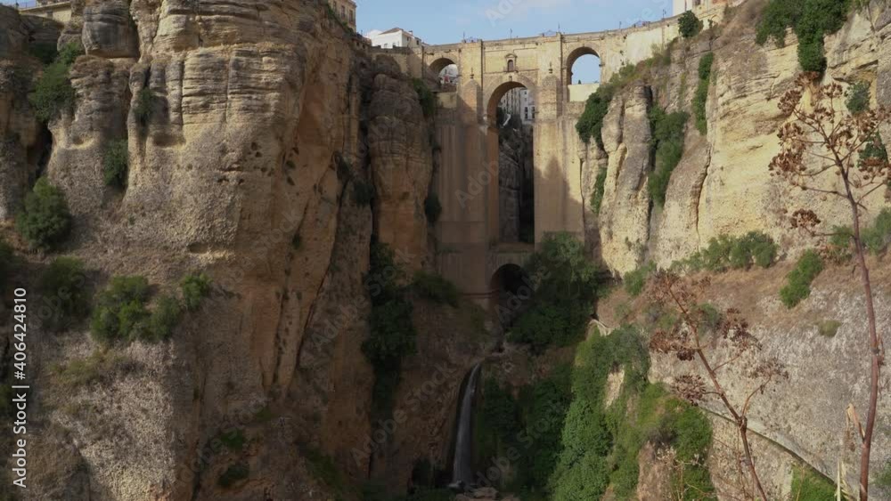 Wide exterior view of the popular Ronda Bridge, also called Nuevo Bridge in the mountains over Tajo gorge in Spain. Wide exterior view of the popular Ronda Bridge, also called Nuevo Bridge in the mountains over Tajo gorge in Spain.