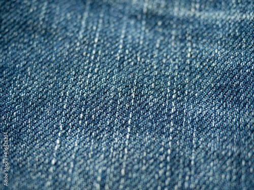 Blue pants Saw the fine pattern of the fabric Put on a yellow background