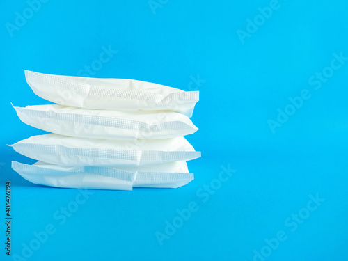 Unopened wrap of sanitary napkins Used to prevent menstruation in women. The wrap was placed in layers.