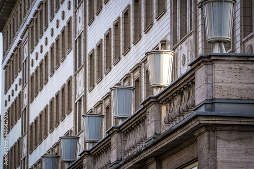 lamps queued up in front of building © Denis Feldmann