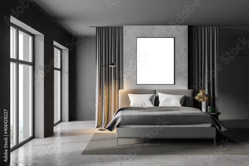 Gray and concrete bedroom with poster