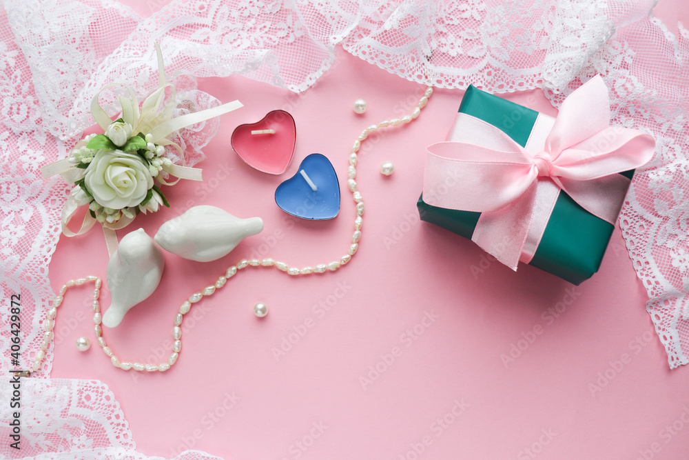 romantic composition for valentine's day. valentine's day background. red heart, lace, figurines of white birds and space for text romantic composition for valentine's day. valentine's day background. red heart, lace, figurines of white birds and space for text