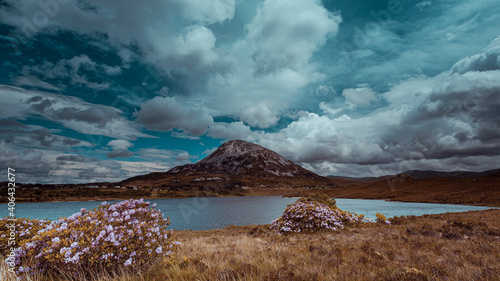 Mount Errigal, Co. Donegal, Ireland, Mount Errigal, Co. Donegal, Ireland, reflected in blue lake surrounded by peatland in national park