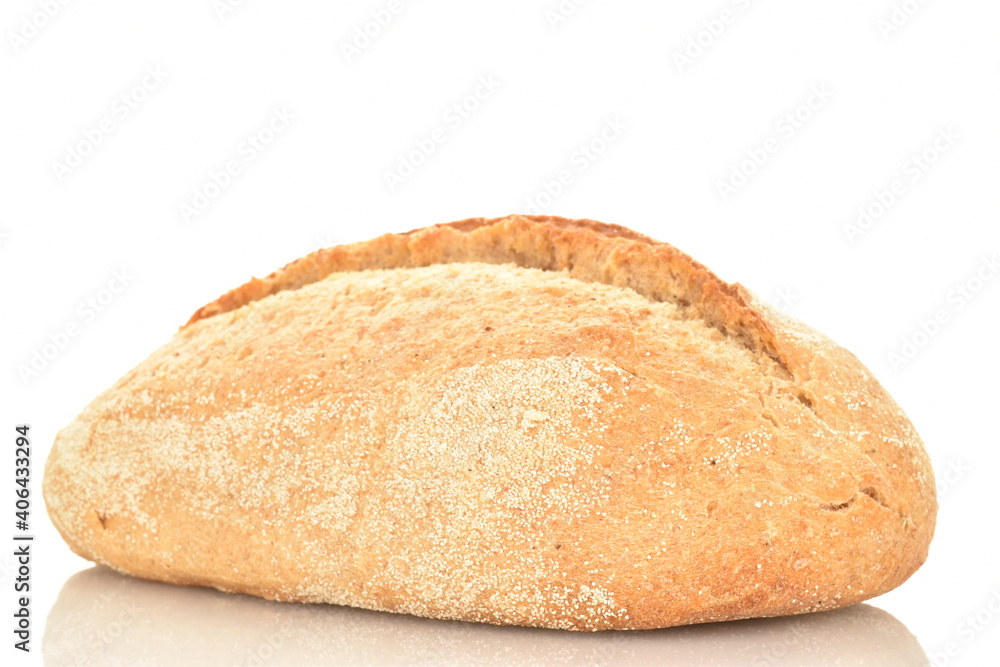 One loaf without yeast with bran cereal, close-up, on a black background.