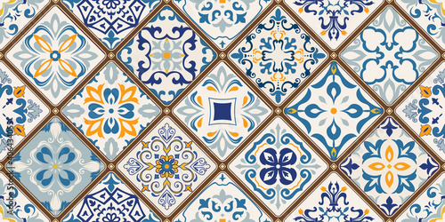 Seamless colorful patchwork tile with Islam, Arabic, Indian, ottoman motifs. Majolica pottery tile. Portuguese and Spain decor. Ceramic tile in talavera style. Vector illustration.