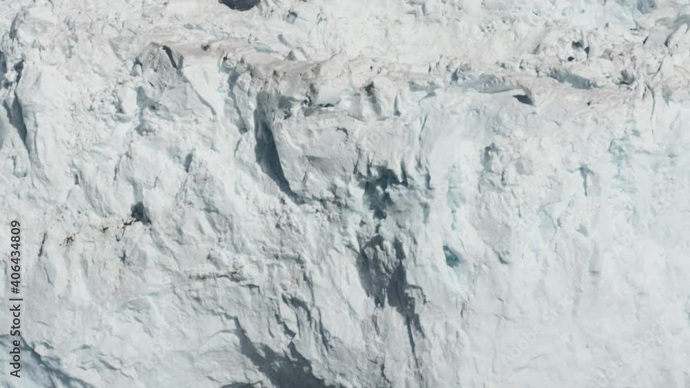 Slowmotion shot, showing a piece of Ice falling into the Sea in the Antarctica. Global warming and Ice Melting. Slowmotion shot, showing a piece of Ice falling into the Sea in the Antarctica. Global warming and Ice Melting.
