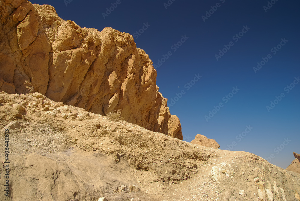 Oasis in Chebika, Tunisia. Sahara desert. Rocks, stones and blue sky Oasis in Chebika, Tunisia. Sahara desert. Rocks, stones and blue sky