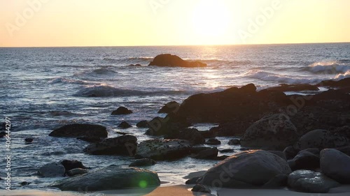 Sunset by the Sea - a lot of rocks . flare, dreamy style-holidays - 4k photo