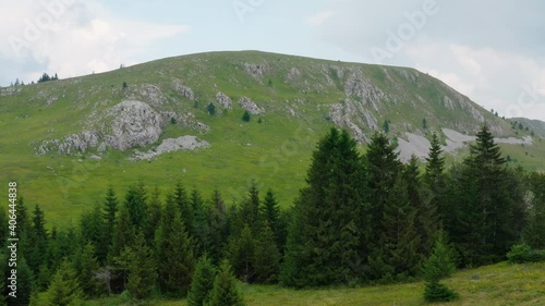 Aerial truck shot of Jadovnik mountain in southwestern Serbia on a bright clear day. photo