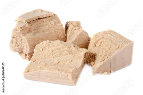 Yeast isolated on white background. Pressed fresh yeast for making bread and dough isolated on white background. Yeast pieces isolated on white background. Pile of pressed yeast.
