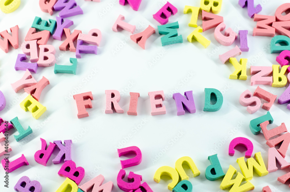Scattered letters on a white surface. Word among letters. The word Scattered letters on a white surface. Word among letters. The word