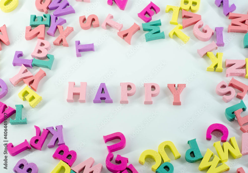 Scattered letters on a white surface. Word among letters. The word Scattered letters on a white surface. Word among letters. The word