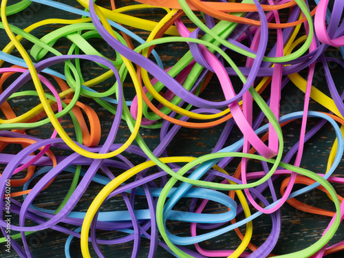 A tangled mess of colourful elastic bands