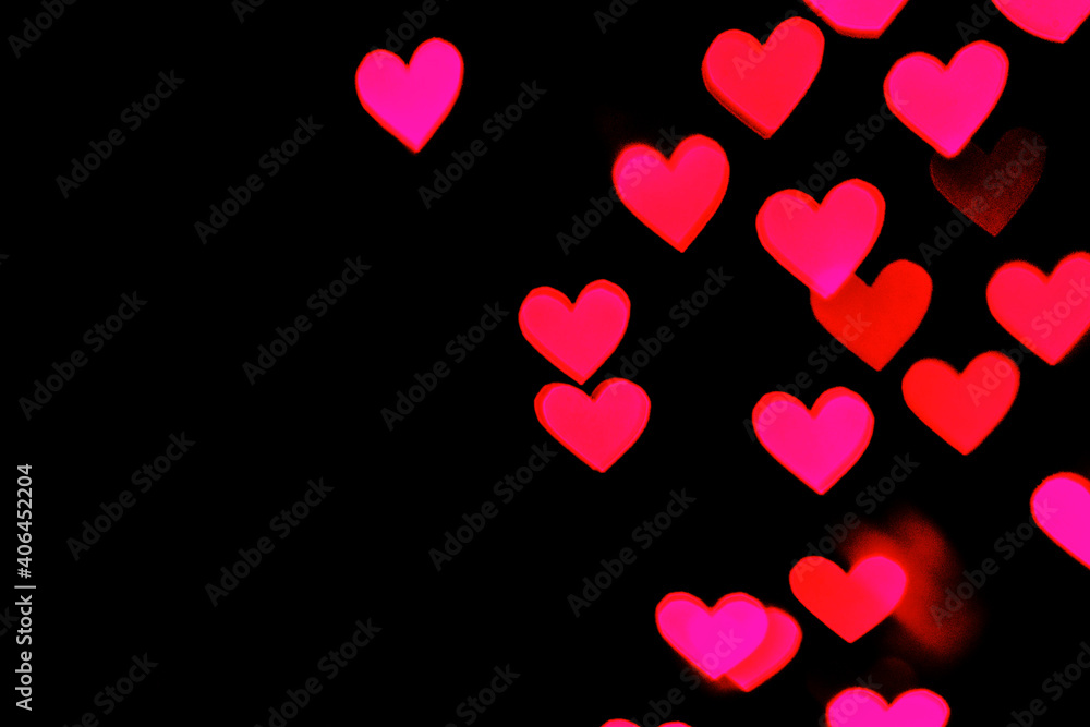 Festive overlay effect. Blurred red and dark pink heart bokeh festive glitter background. Christmas, New Year and Valentine's day design with copy space Festive overlay effect. Blurred red and dark pink heart bokeh festive glitter background. Christmas, New Year and Valentine's day design with copy space