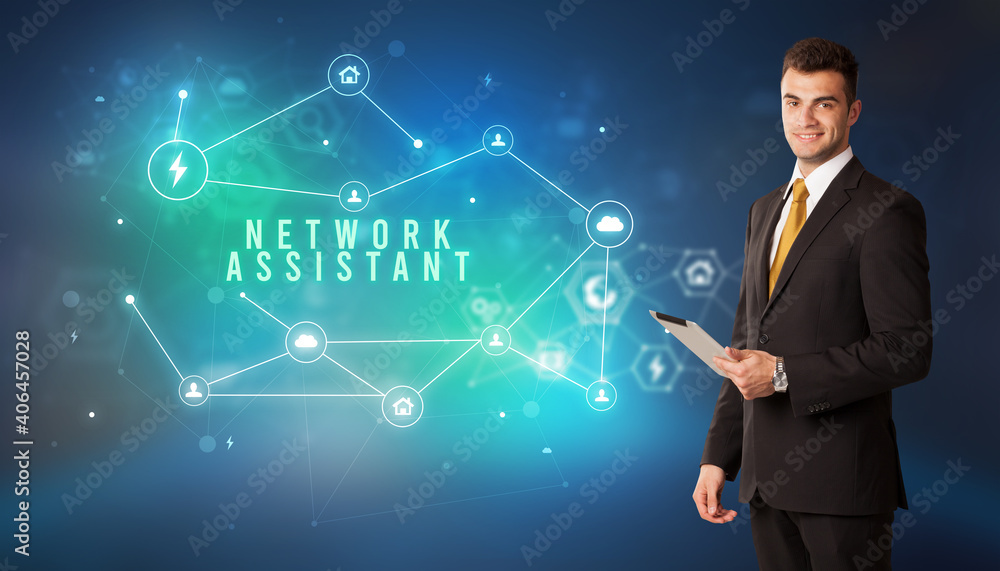 Businessman in front of cloud service icons with NETWORK ASSISTANT inscription, modern technology concept Businessman in front of cloud service icons with NETWORK ASSISTANT inscription, modern technology concept