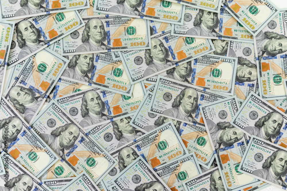 Texture of US dollars. Background of one hundred dollar bills. Texture of US dollars. Background of one hundred dollar bills.