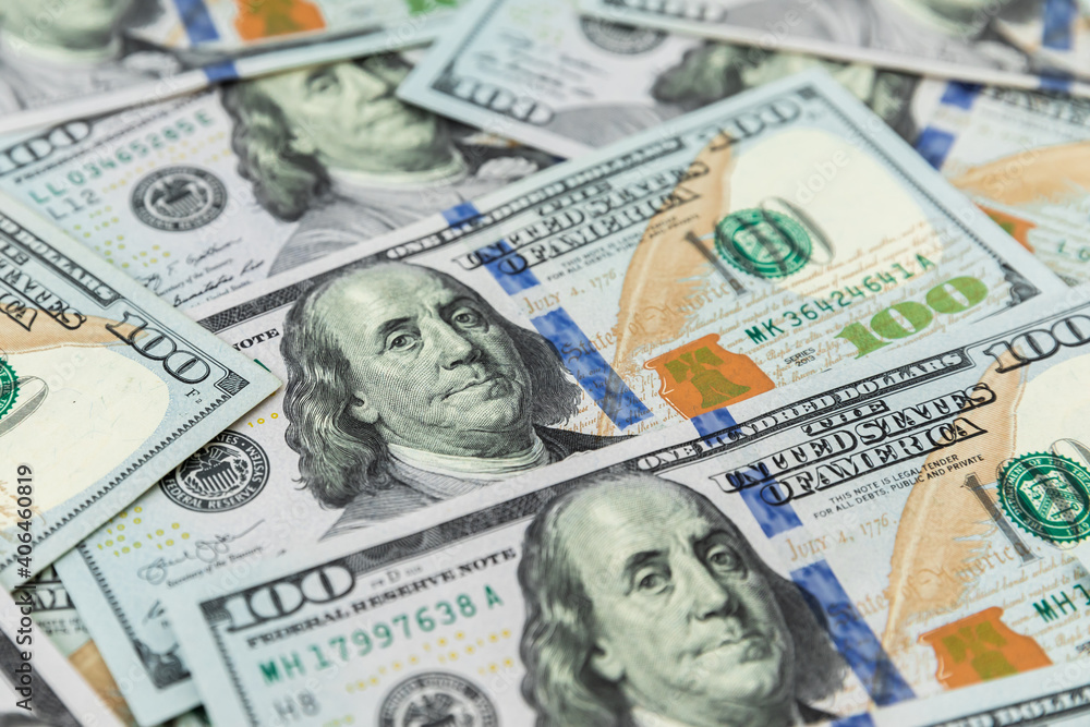 Texture of US dollars. Background of one hundred dollar bills. Texture of US dollars. Background of one hundred dollar bills.