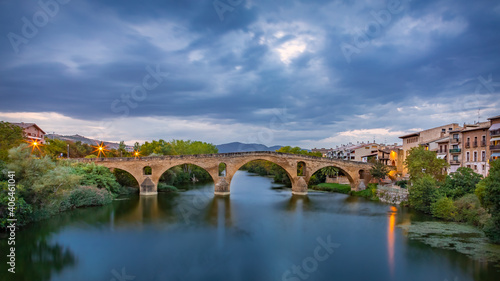 The Early Blue Hour on a Cloudy Evening over the Iconic Bridge in Puente la Reina, along the French Way of St James Camino de Santiago