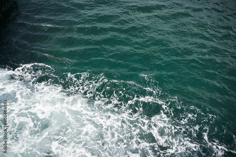 Clean ocean water with waves and white foam Clean ocean water with waves and white foam