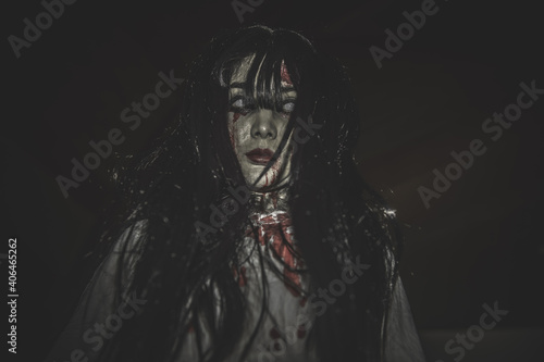 Portrait of asian woman make up ghost,Scary horror scene for background,Halloween festival concept,Ghost movies poster