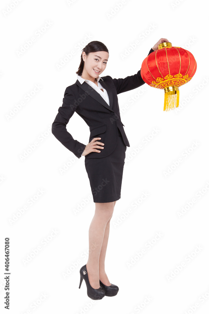 A young Business womman holding red lantern A young Business womman holding red lantern