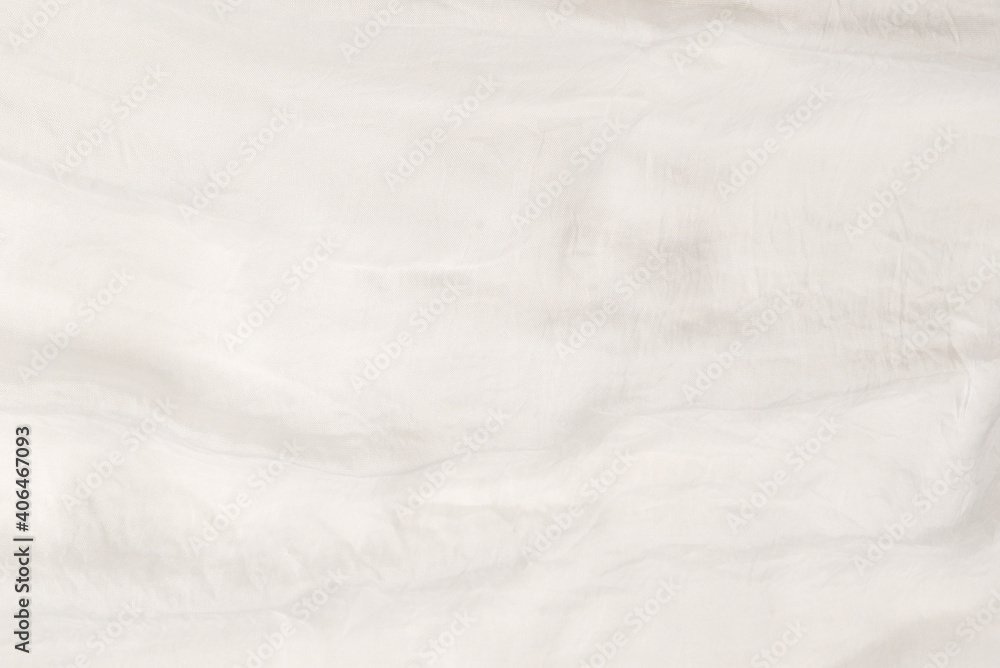 Soft smooth white silk fabric background. Fabric texture.