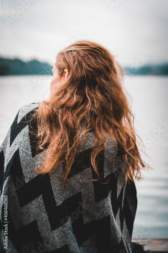 Girl sitting on Dock at Lake Eibsee