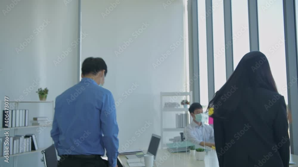 Business concept of 4k Resolution. Employees are greeting each other by hitting elbows in the office. Business concept of 4k Resolution. Employees are greeting each other by hitting elbows in the office.