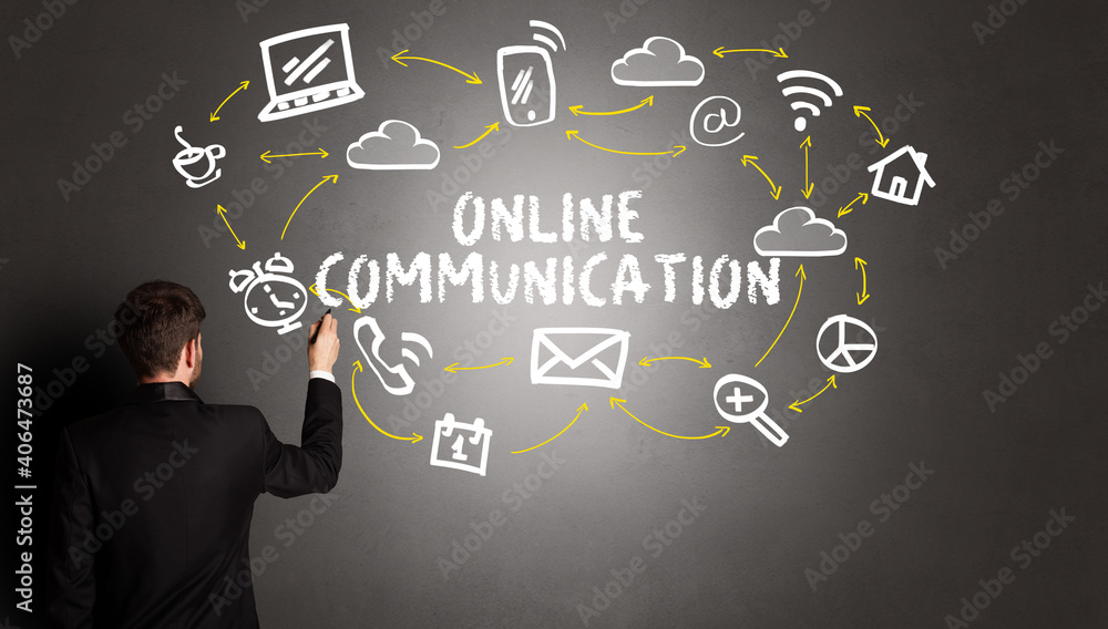 businessman drawing social media icons with ONLINE COMMUNICATION inscription, new media concept businessman drawing social media icons with ONLINE COMMUNICATION inscription, new media concept