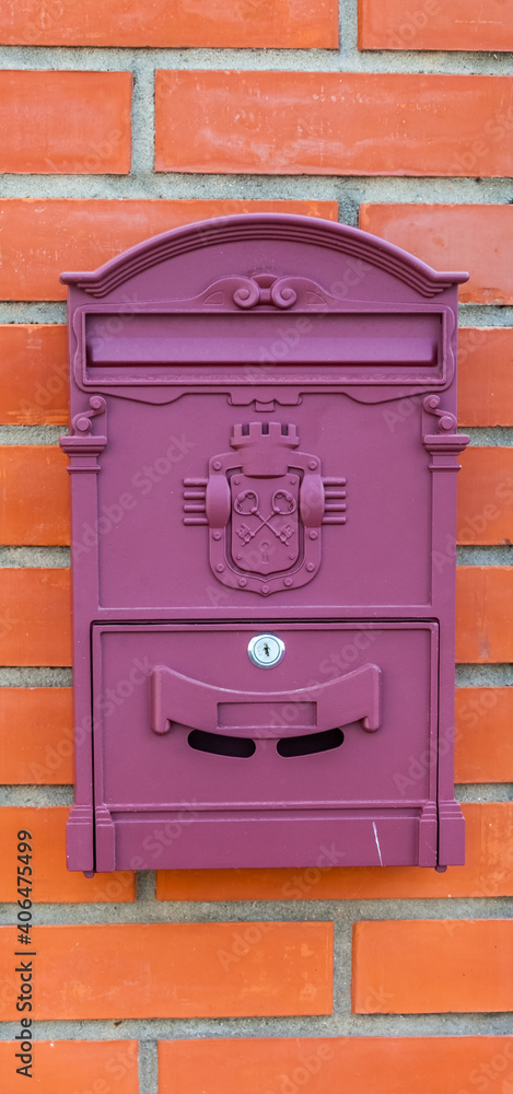 Mailbox on the brick wall of the house Mailbox on the brick wall of the house