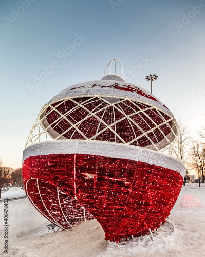Decorations of the city Park in the form of Christmas balls with lighting in the evening photo