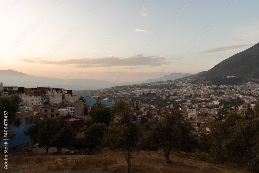 sunset over the blue city Chefchaouen in Morocco