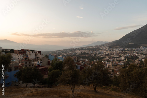 sunset over the blue city Chefchaouen in Morocco