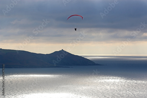 Storm Clouds and paraglider above Whitsand Bay, Cornwall 