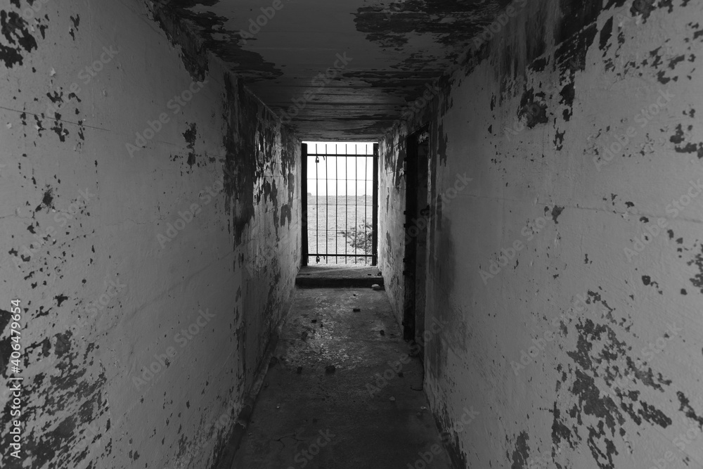 WW2 German bunker, Jersey, U.K. Scary corridor and gated entrance from 1945.