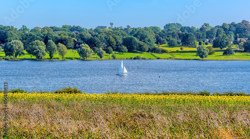 A view towards the south shore of Rutland Water reservoir from the peninsula in summertime photo