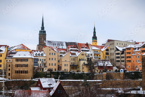Bautzen oldtown during winter season snow, ice towers old buildings houses, german, tower, spree, water river, cold dark, blue