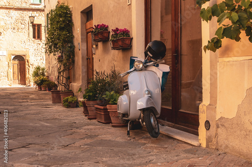 Fototapeta Naklejka Na Ścianę i Meble -  traditional scooter in a small town in Tuscany, Italy