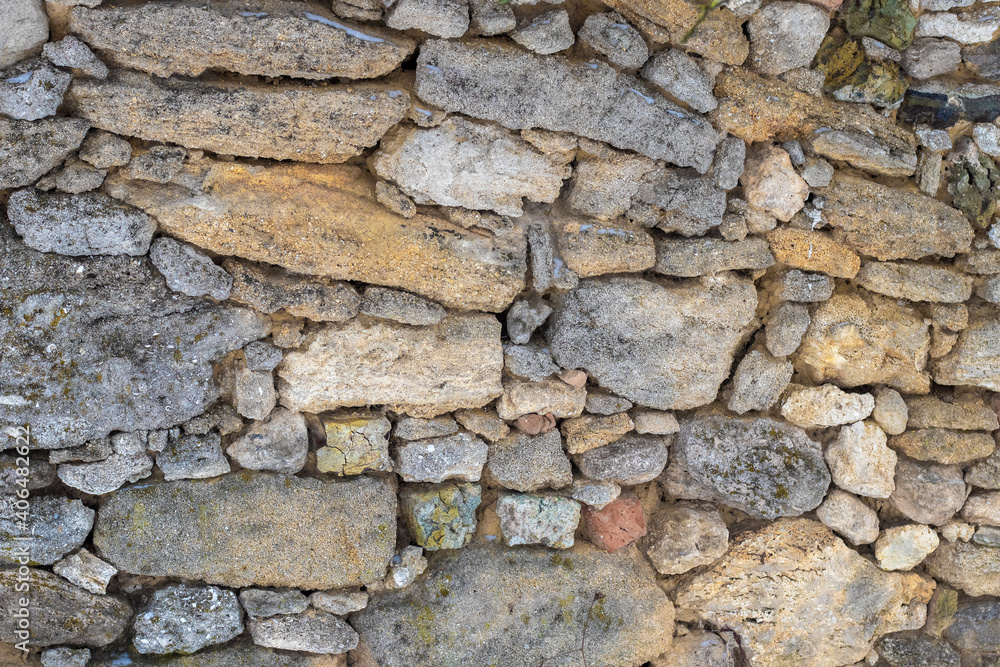 Old masonry wall in an abandoned house