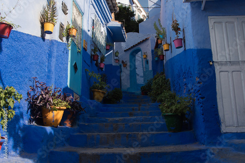 narrow street in the blue city Chefchaouen, Morocco © Stephan