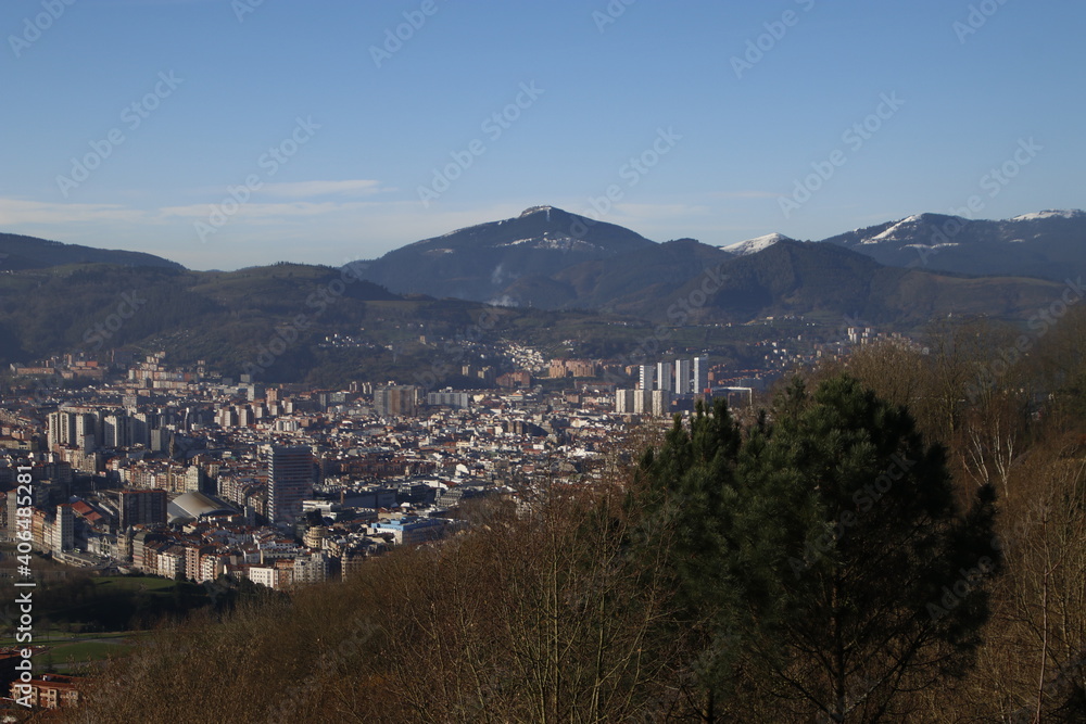 View of Bilbao from a hill in a sunny winter day