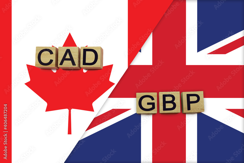 Canada and United Kingdom currencies codes on national flags background Canada and United Kingdom currencies codes on national flags background
