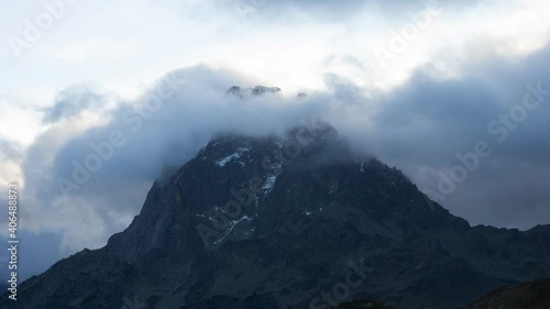 Time - lapse of Pic du Midi d'Ossau, Lac d' Ayous. Stunning nature landscape. Cloud's timelapse. photo