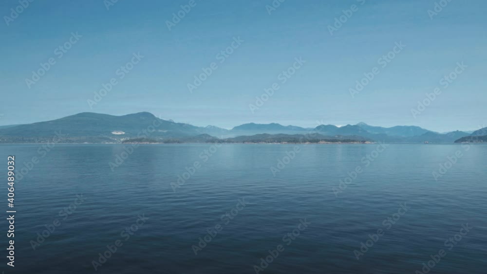 Stationary Shot of the Vancouver Shoreline from the Ocean. Stationary Shot of the Vancouver Shoreline from the Ocean.