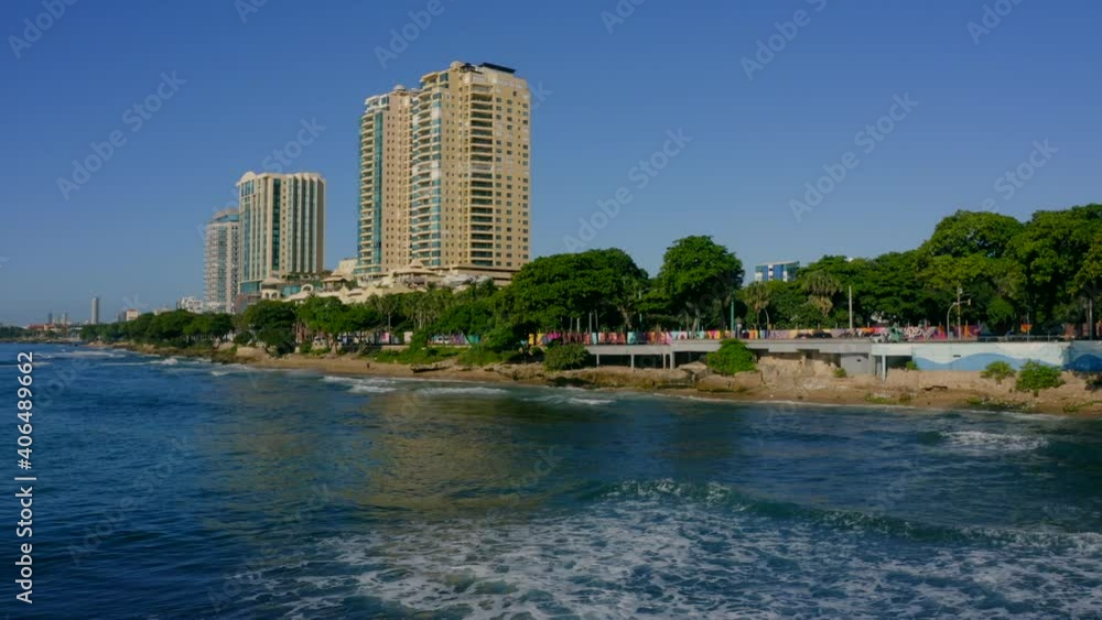 Calm blue waves rolling to the seaside road in Malecon, Cuba -Aerial Calm blue waves rolling to the seaside road in Malecon, Cuba -Aerial