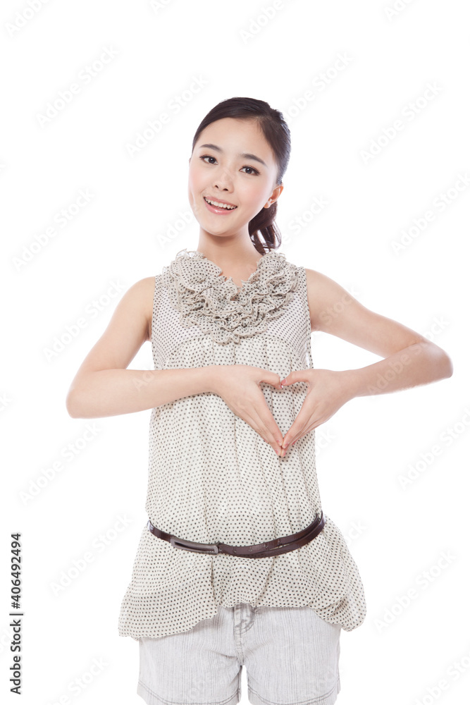 Portrait of Young woman's hands forming heart Portrait of Young woman's hands forming heart