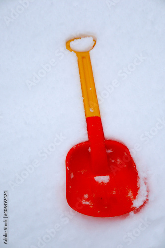winter games colorful plastic child toy shovel in the snow wallpaper