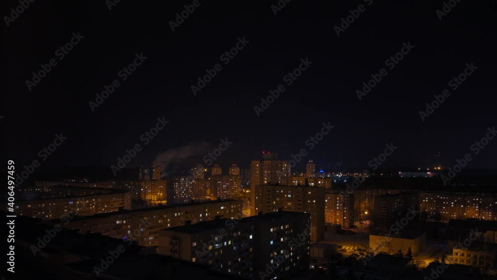 Night view Cityscape hyperlapse late at night in the city. High angle view of sleeping area of town at night. Long exposure hyperlapse.
Light blinks in the windows of the sleeping area of the city Night view Cityscape hyperlapse late at night in the city. High angle view of sleeping area of town at night. Long exposure hyperlapse.
Light blinks in the windows of the sleeping area of the city