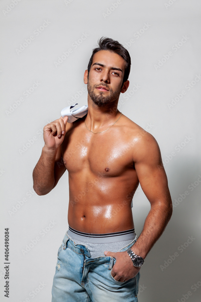 Young handsome man isolated on gray background Young handsome man isolated on gray background
